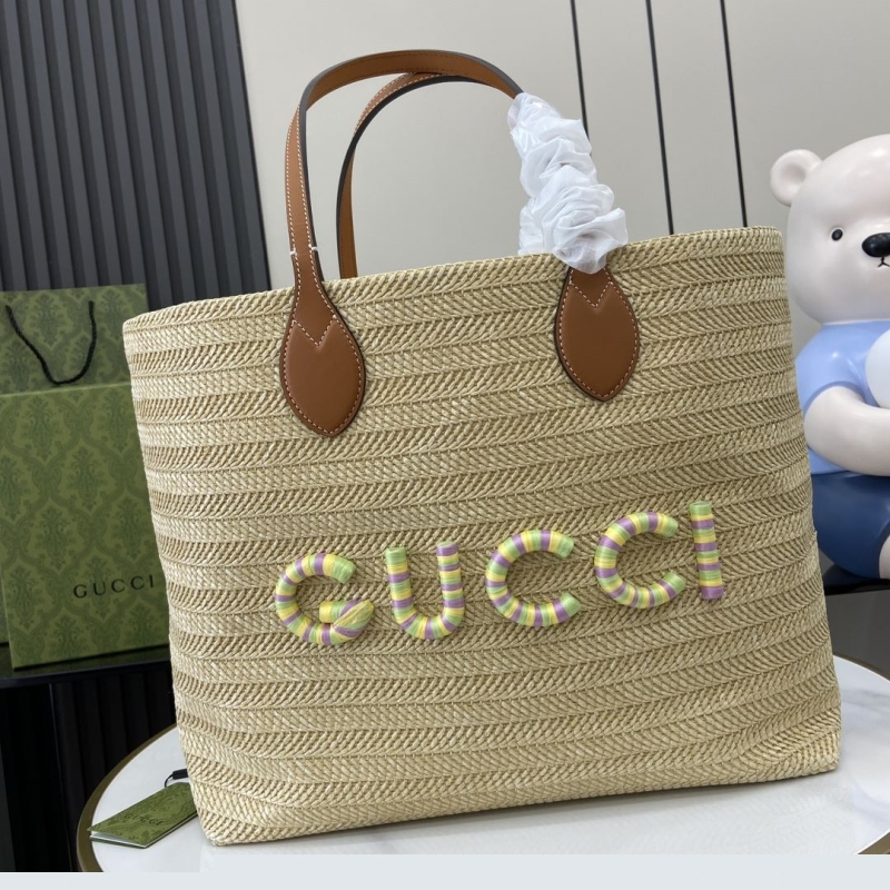 G*u*i shopping bags